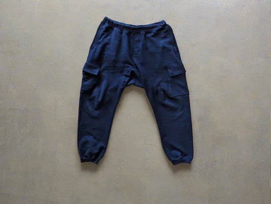 Heavyweight Cargo Trackpants in Deep Navy with Side pockets on outside and inside. ribbed and tight ankles, elastic waistband